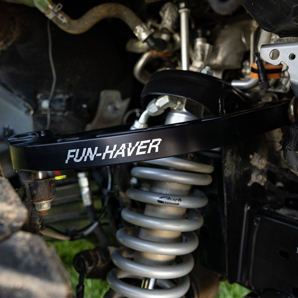 Enhance your Ford Bronco's suspension with Fun Haver Off-Road Upper Control Arms. Built from CNC machined 6061-T6 billet aluminum, these control arms offer increased wheel travel, superior strength, and durability for rugged terrains. Correct axle geometry, boost usable wheel travel, and reduce wear on factory ball joints. Upgrade your Ford Bronco's performance and reliability with Fun Haver Off-Road Upper Control Arms.